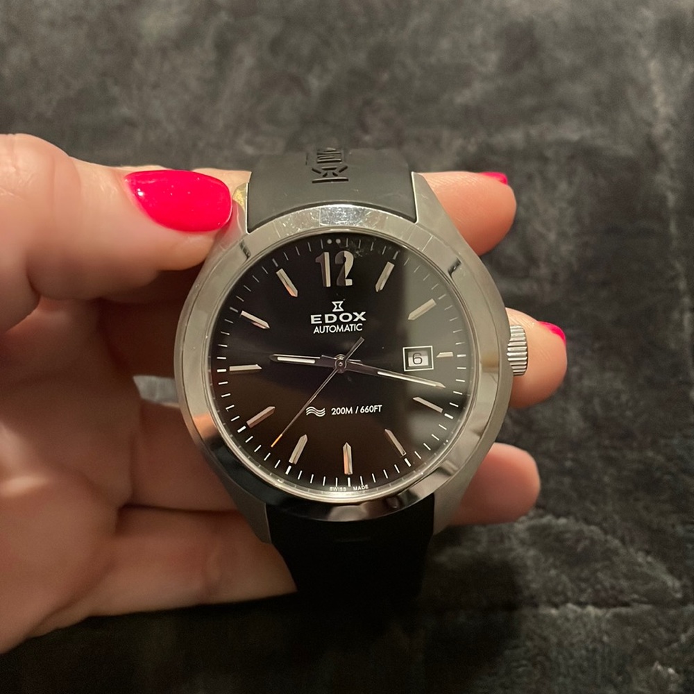 This watch is like new, and has only been worn a few times. It works perfect.